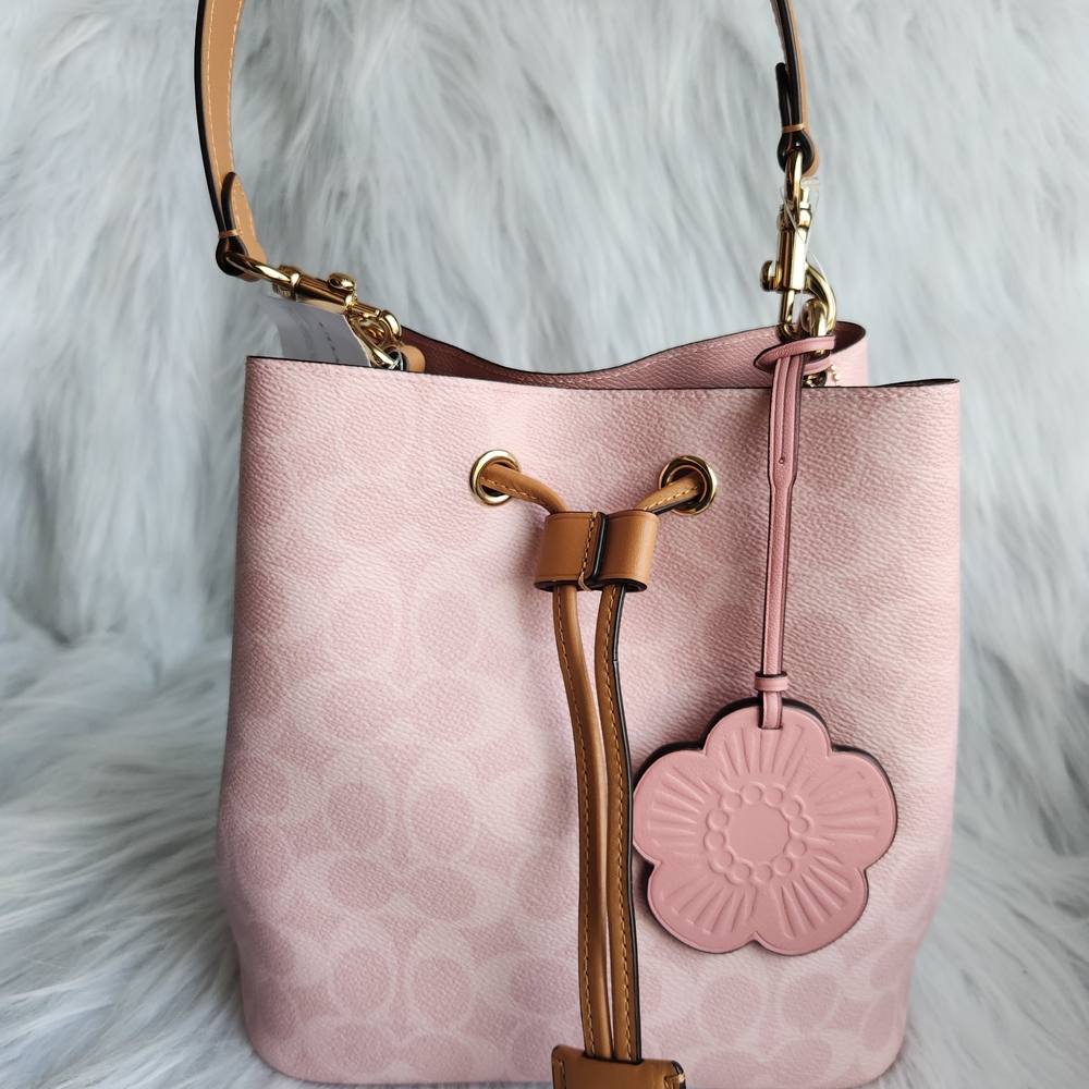 Coach Powder Pink Floral Embossed Drawstring Bucket Bag CEA23